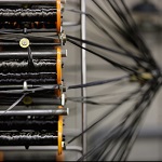 A creel for unwinding carbon fibre spools in composites manufacturing