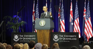 Photo of former US President Barack Obama speaking at the University of Queensland