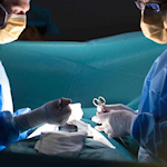 Two surgeons at the operating table