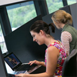 Students sitting in a computer lab