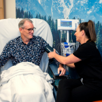 Researcher and patient at Clinical Trials Centre