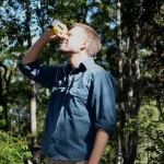 Researcher looking for fauna with binoculars
