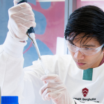 Researcher using a pippette